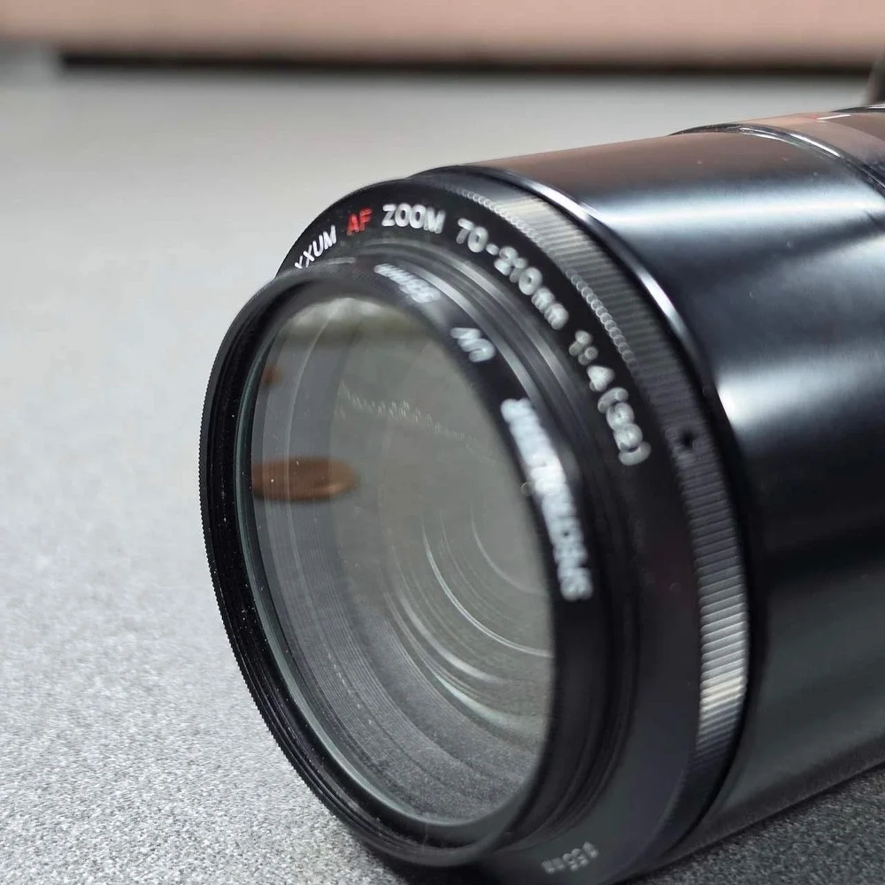 Minolta Maxxum 70 SLR Film Camera 35mm Excellent 70-210mm f/4.5-5.6 lens Works.